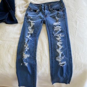 American Eagle jeans with rips.